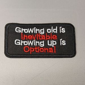 Black Patch with White and Red Text